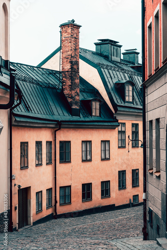 Beautiful cobblestone street surrounded by the traditional houses in Sodermalm photo