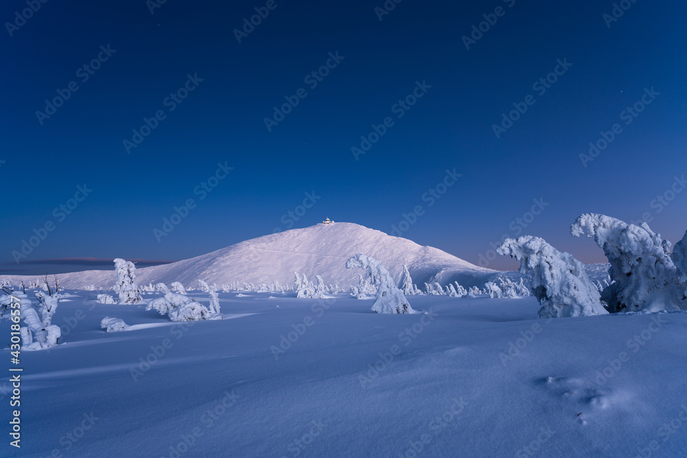amazing view on Karkonosze mountain in winter during dusk in Poland