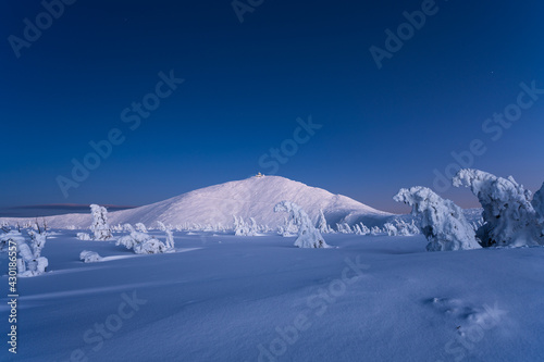 amazing view on Karkonosze mountain in winter during dusk in Poland
