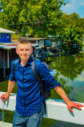 Tourist FARANG with the Prem Prachakon canal river Bangkok Thailand. photo