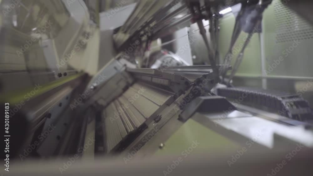 automatic knitting machine moves back and forth, textile industry slow motion automatic knitting machine moves back and forth, textile industry slow motion