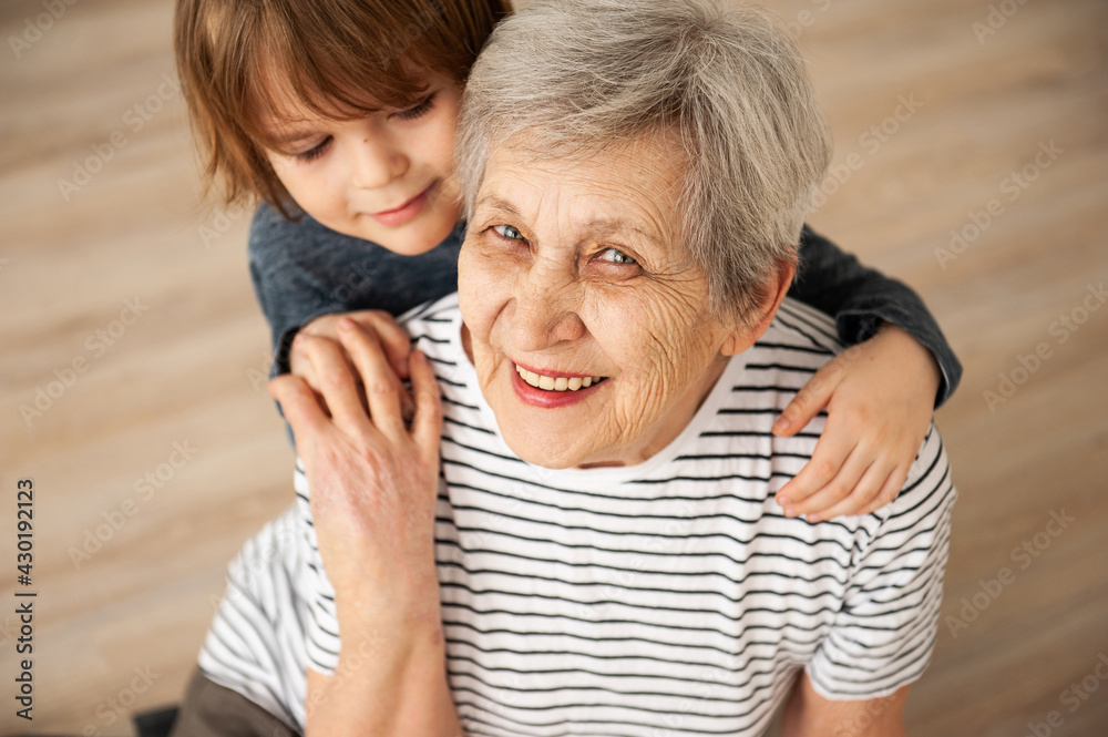Fototapeta premium Grandmother and grandson spend time together.