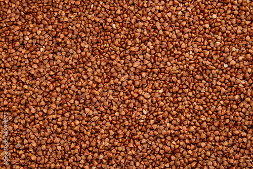 Buckwheat, dry buckwheat background. Buckwheat texture