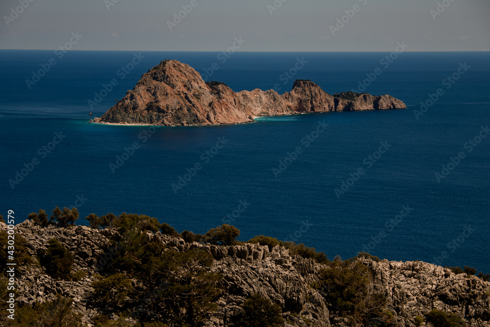 Wonderful view of stone island in turquoise mediterranean sea