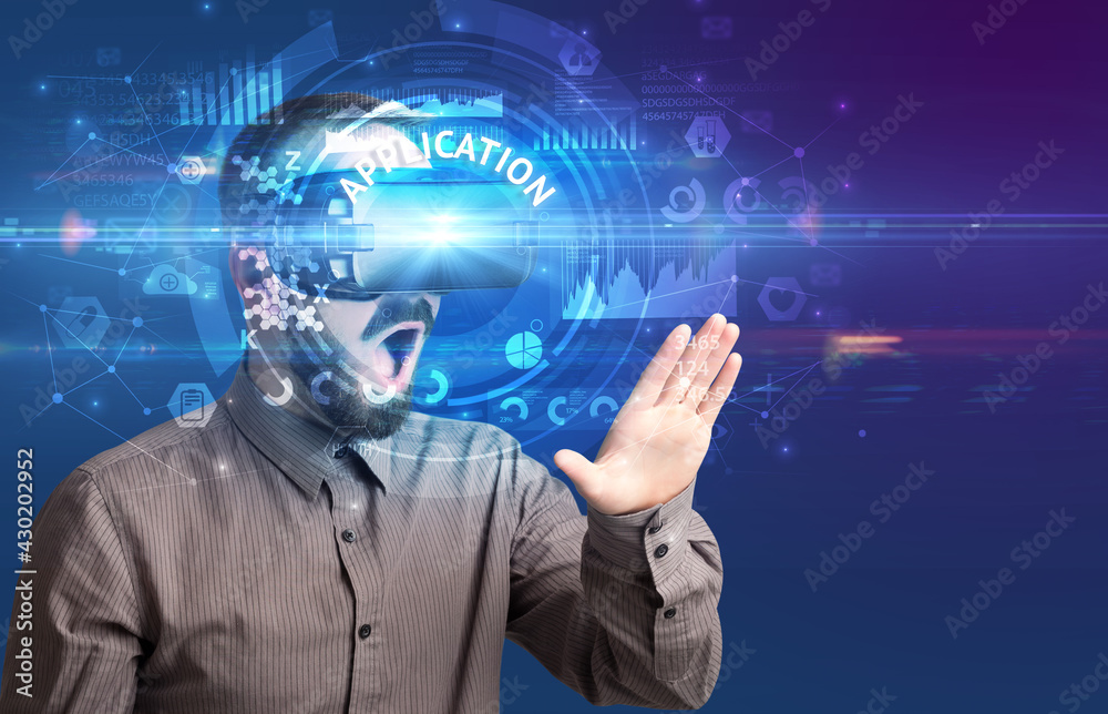 Businessman looking through VR glasses Businessman looking through VR glasses