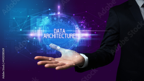 Wallpaper Mural Man hand holding digital technology concept Torontodigital.ca