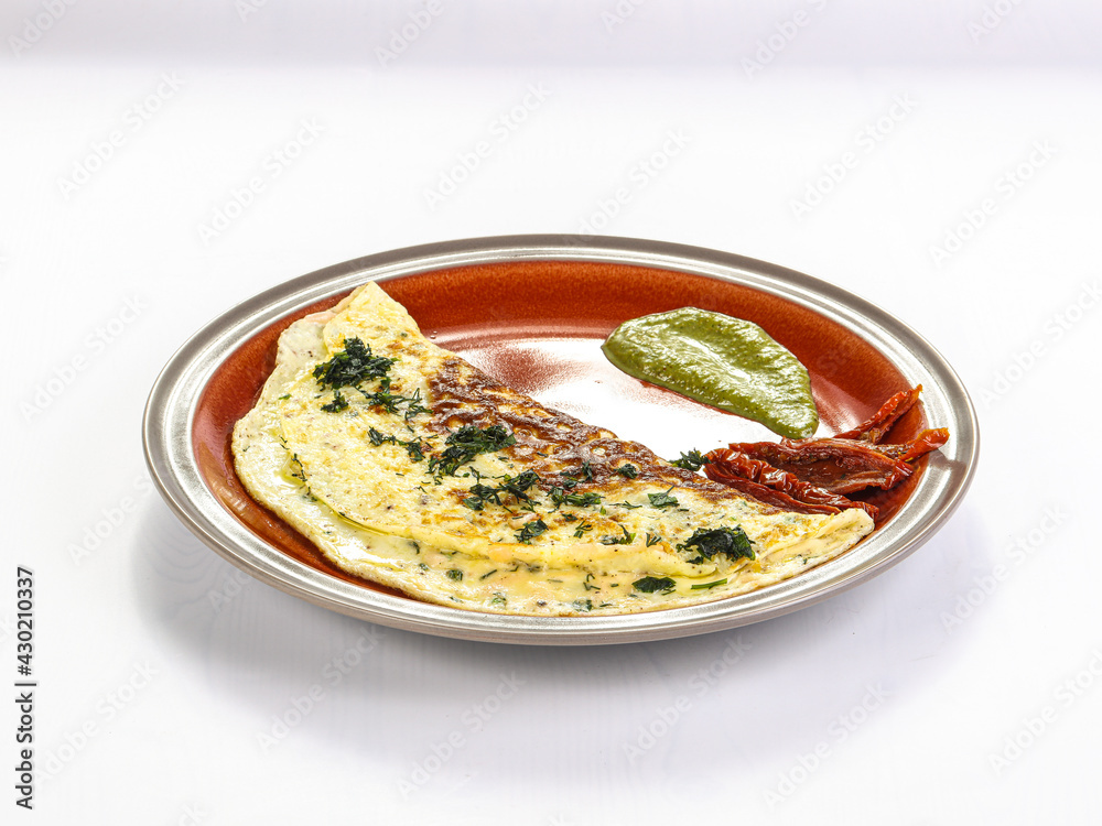 Omelet for breakfast served parsley Omelet for breakfast served parsley