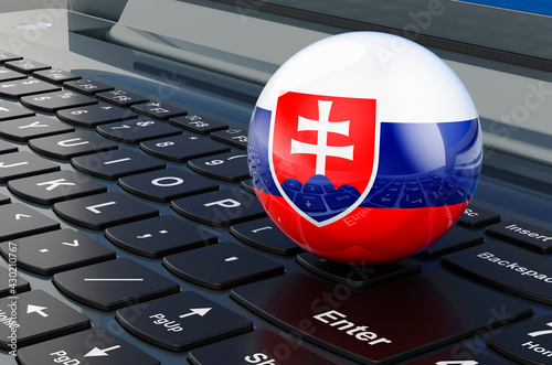 Slovak flag on laptop keyboard. Online business, education, shopping in Slovakia concept. 3D rendering