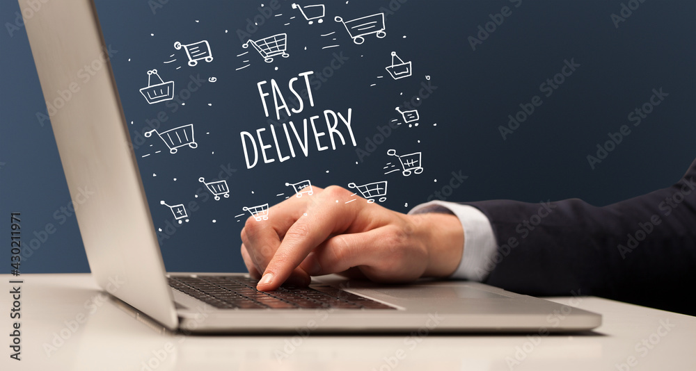Businessman working on laptop, e-commerce concept Businessman working on laptop, e-commerce concept