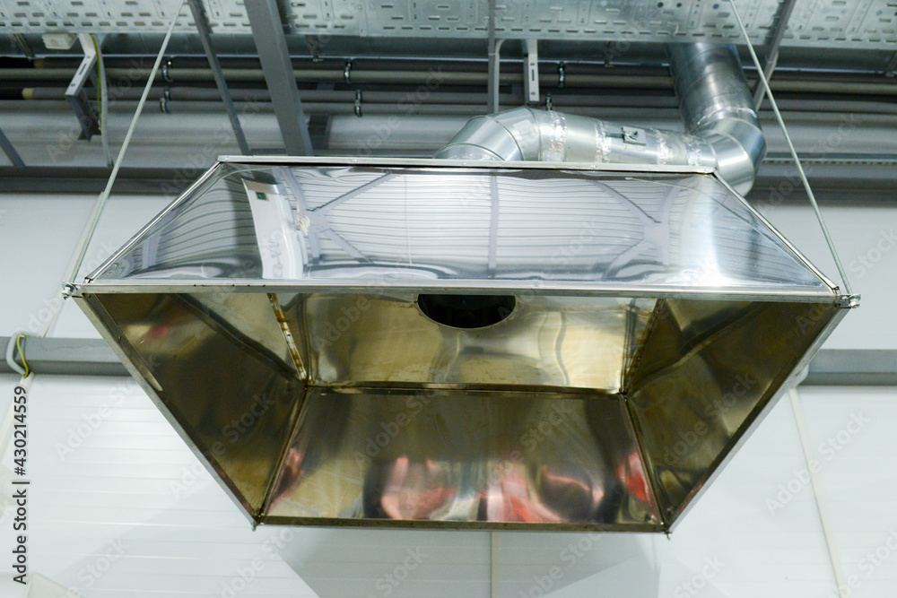 Glossy surface of the suspended hood.