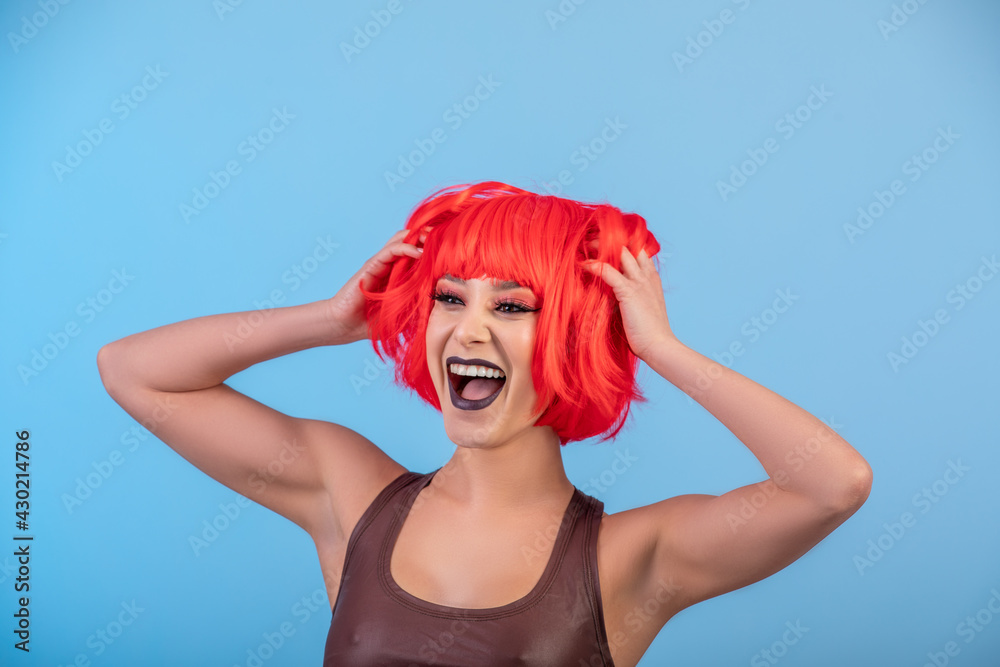 Portrait of beautiful sexy woman in red wig Bob hairstyle