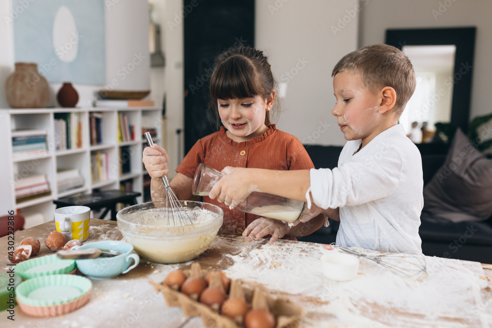 children baking with their mother at home children baking with their mother at home