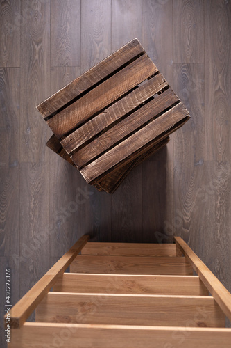 Stack of wooden box on floor laminate background. Wood boxes crate
