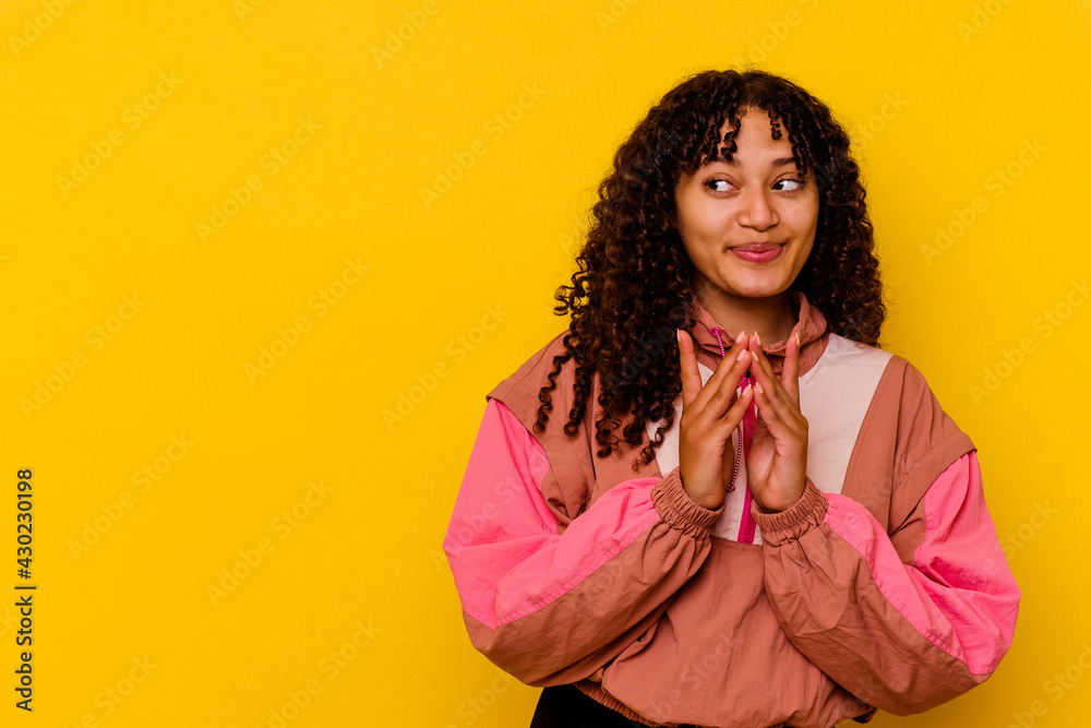 Young mixed race woman isolated on pink background making up plan in mind, setting up an idea.