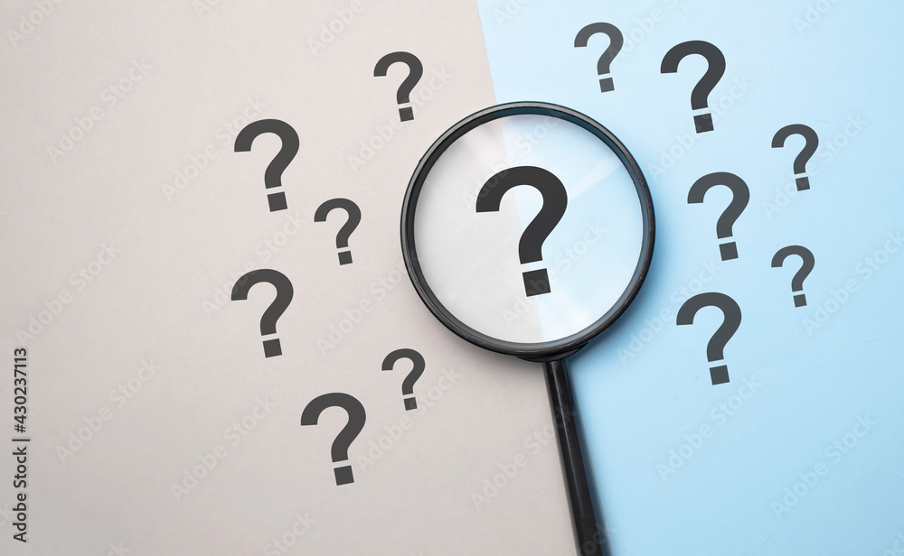 Magnifying glass with question mark symbol. Concept creative idea and