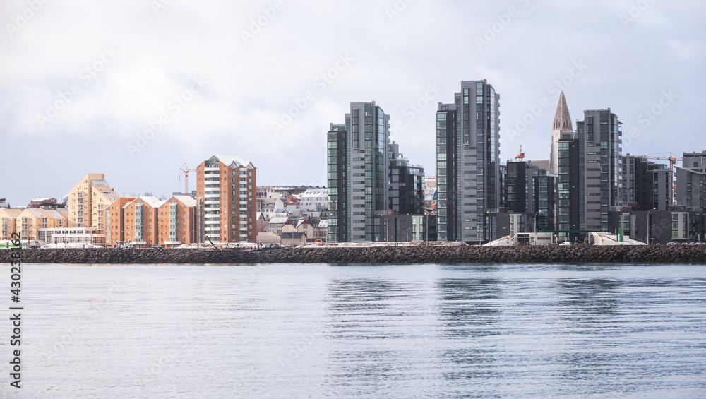 Urban skyline with modern buildings. Coastal view of Reykjavik Urban skyline with modern buildings. Coastal view of Reykjavik