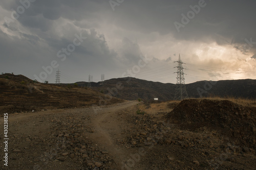 Beautiful evening off road view from Kanifnath ghat at bopgoan , Pune. Road goes through connecting different mountains and hills