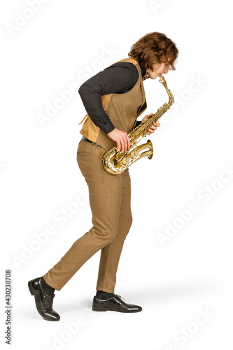 Full length portrait of a young man playing on saxophone isolated on white background