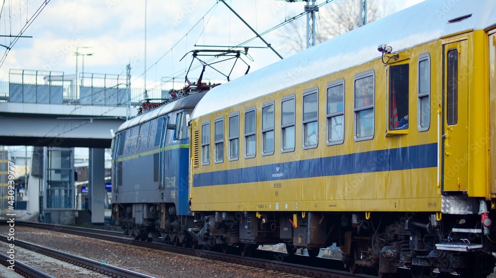 Passenger train of public transport on railroad track.