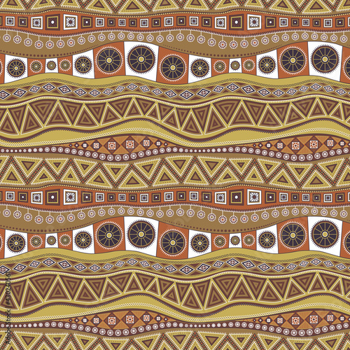 Geometric seamless pattern on the them.e of African ornaments in ocher brown colors.