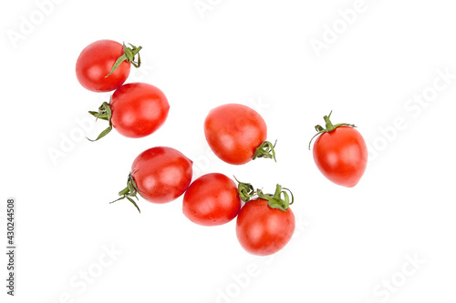 Tomatoes isolated on white. Heap of fresh red tomatoes