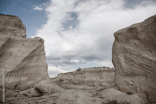 Abandoned limestone quarry. Interesting form of relief. Amazing hills and ground. Dry areas of the earth. Global warming