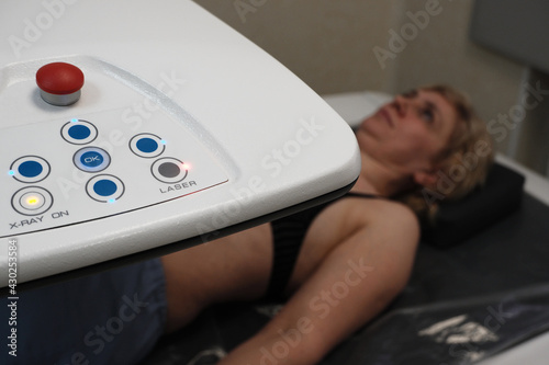 Investigation of the density of human bones using an osteodensitometry apparatus.