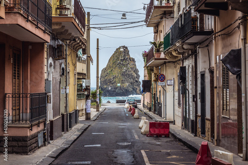 One of the Cyclopean Isles seen from street in Aci Trezza township on Sicily Island  Italy