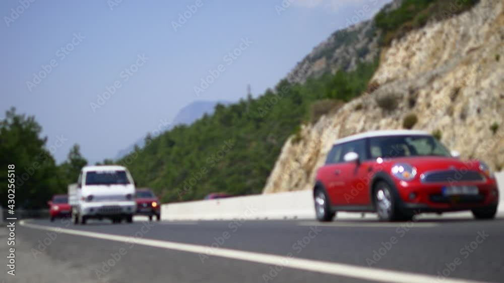 Front view of approaching cars on a country road. Out of focus. Asphalt mountain road in Anatolia, Turkey. 4K Static Shot, color graded file in Pana Cine-like Dynamic range
Front view of approaching cars on a country road. Out of focus. Asphalt mountain road in Anatolia, Turkey. 4K Static Shot, color graded file in Pana Cine-like Dynamic range