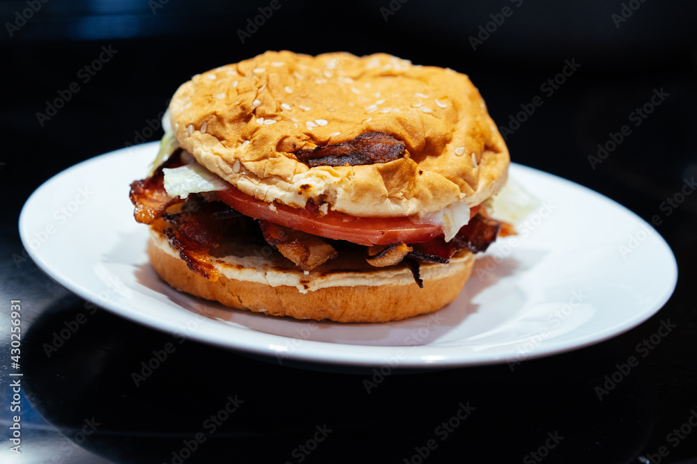 Delicious hamburger ordered from a restaurant Delicious hamburger ordered from a restaurant