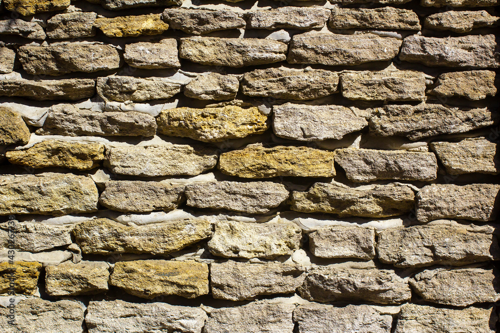 Obraz premium Rough stone masonry texture