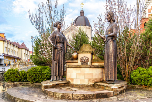 Truskavets, Ukraine - April 2021: Greek Catholic Church of St. Nicholas and Sculpture 