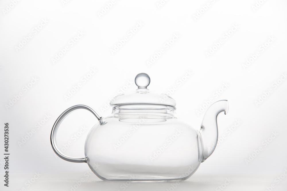 Transparent empty glass teapot isolated on white background Transparent empty glass teapot isolated on white background