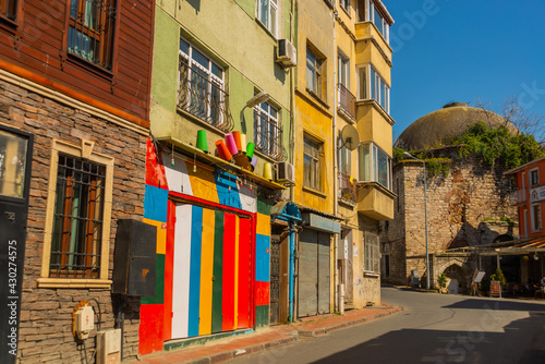 ISTANBUL, TURKEY: Colorful old buildings on a street in the Fatih district of Istanbul's old city photo