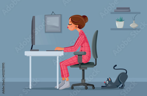 Woman Working Remotely from Home next to her Cat
