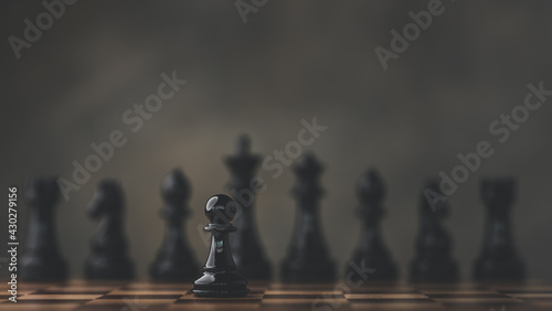 Close-Up Of Chess Pieces Against dark background  International chess  ideas and competition and strategy  business success concept  business competition planning teamwork strategic concept.