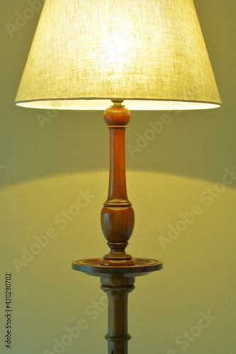 dim lighting room of the mahogany antique lamp.This expensive furniture is made in England. blurred background soft focus image. 