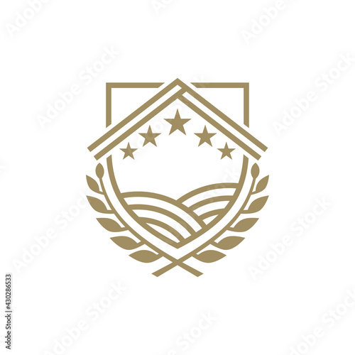 Logo template of shield with wheat and barn suitable for agriculture symbol, organic food icon, rice product label, foodstuffs and others