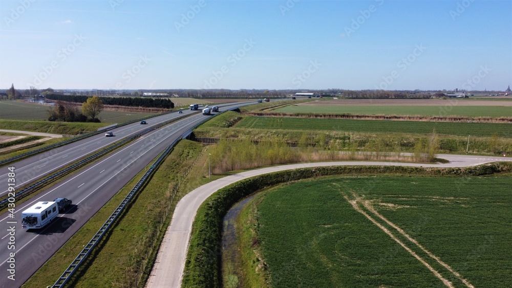 Highway in a rural landscape that connects transport and transport between cities by means of asphalt infrastructure.