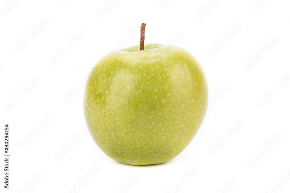One whole green apple on white background, isolated