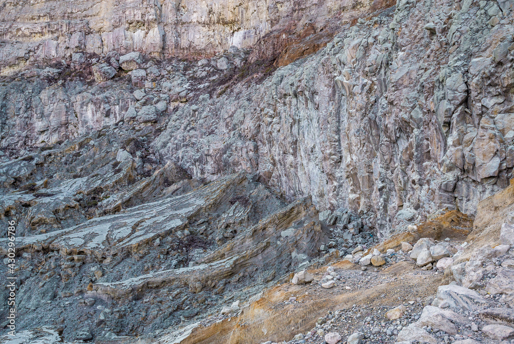 Rock wall and sulphur mining in Ijen crater in the morning in Kawah Ijen volcano Landmark from East Java Indonesia Rock wall and sulphur mining in Ijen crater in the morning in Kawah Ijen volcano Landmark from East Java Indonesia