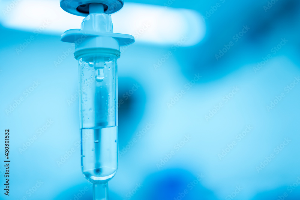 IV drip chamber, IV tubing, and IV bag of solution with copy space.Set iv fluid intravenous drop saline drip hospital room,Medical Concept,treatment emergency and injection of chemotherapy. IV drip chamber, IV tubing, and IV bag of solution with copy space.Set iv fluid intravenous drop saline drip hospital room,Medical Concept,treatment emergency and injection of chemotherapy.