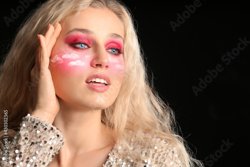 Beautiful young woman with ...
