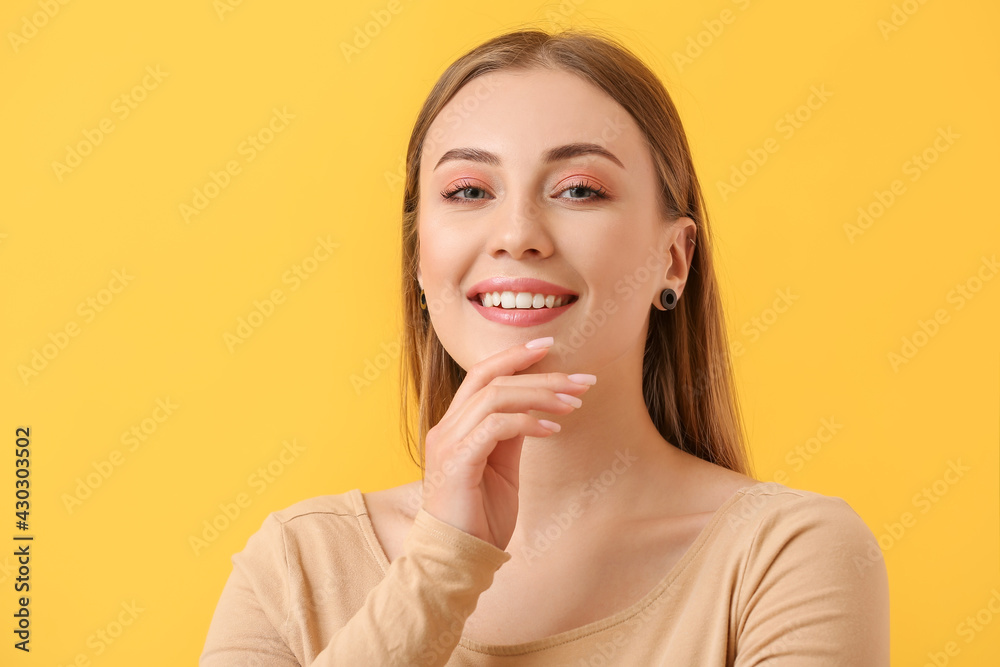 Young woman with beautiful manicure on color background Young woman with beautiful manicure on color background