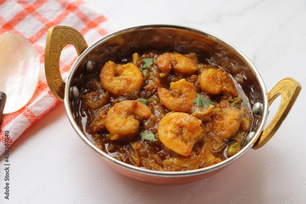 Indian food- Prawns masala or shrimp curry. Also known as Kolambi che Kalvan in Marathi. Chingri fry. Maharashtrian Prawns curry. Copy space. Indian food- Prawns masala or shrimp curry. Also known as Kolambi che Kalvan in Marathi. Chingri fry. Maharashtrian Prawns curry. Copy space.