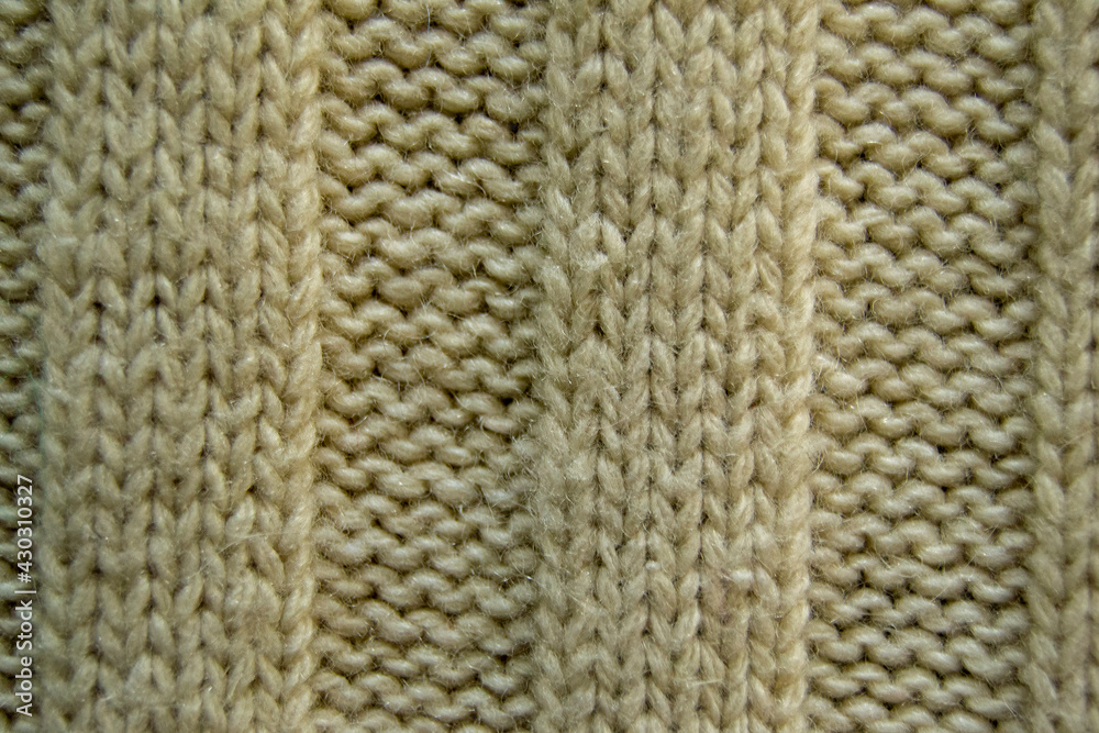 texture of knitted fabric close up. rough weaving texture of knitted fabric close up. rough weaving