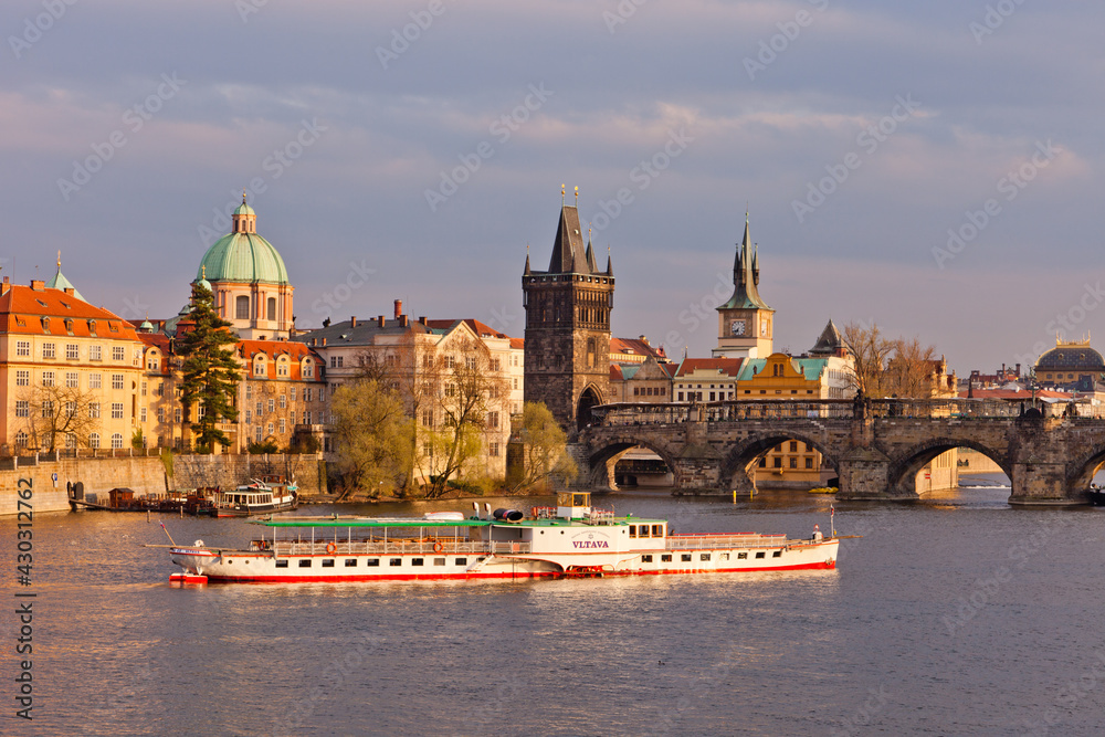 River boat on Moldau in Prague near Charles Bridge