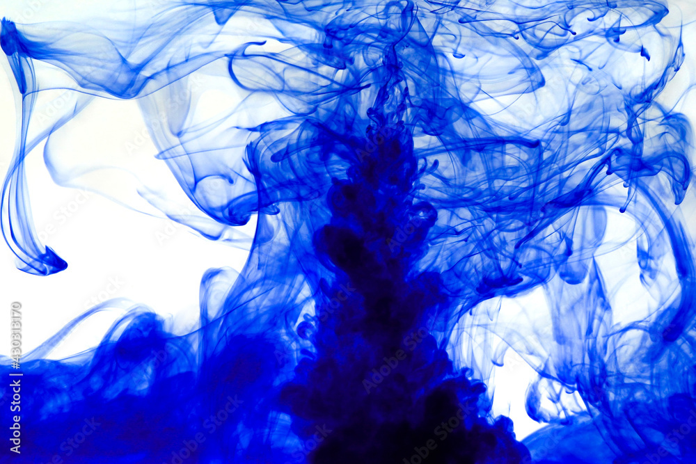 Abstract background picture with blue ink dissolving in water
