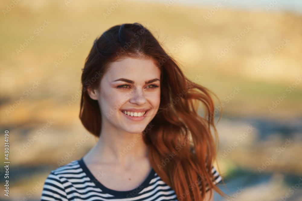 happy woman in the mountains outdoors smile laughter makeup model happy woman in the mountains outdoors smile laughter makeup model