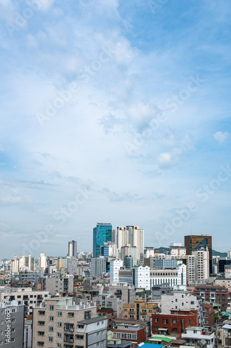 Cityscape of Seoul, South Korea with houses and buildings. Copy space in the sky.